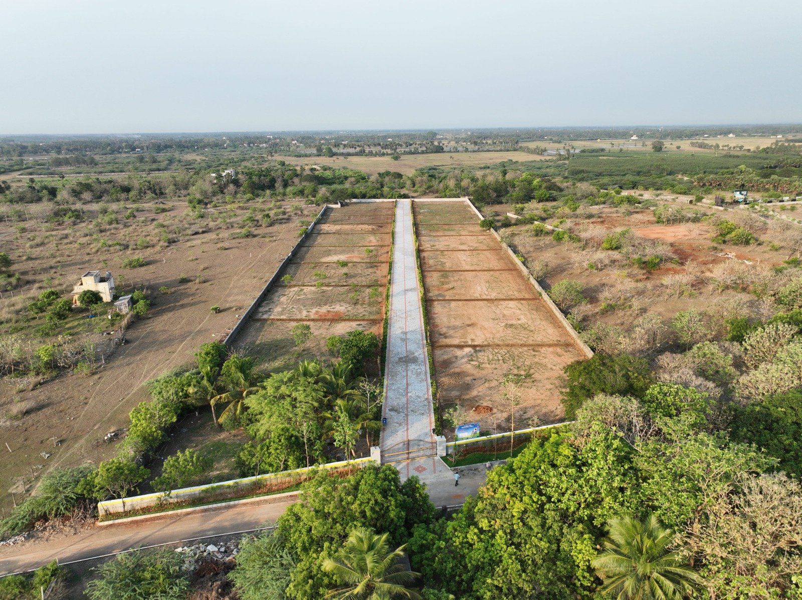 Aerial view of Mannvaasam Farms green plots